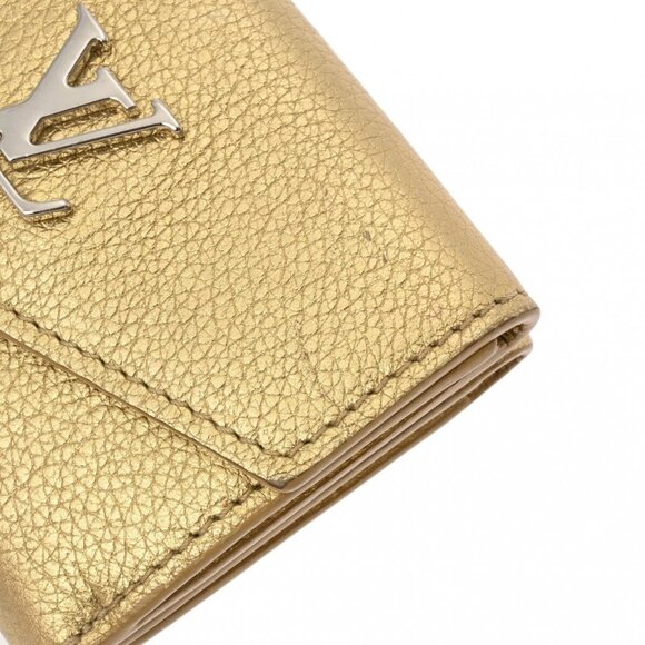 LOUIS VUITTON Gold purse - Picture 12 of 12